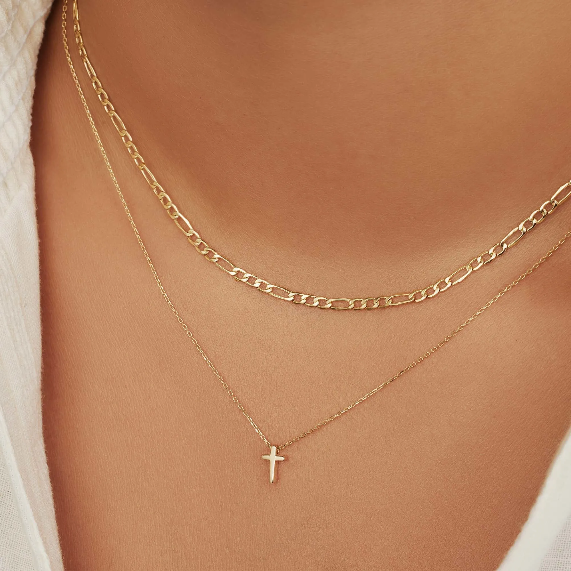 Monceau Solange 14 karat gold necklace with cross